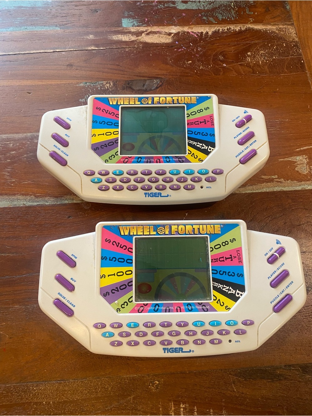 Wheel of Fortune Portable Handheld Game - Tiger - White & Purple